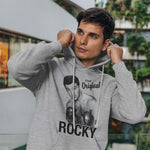 The original rocky adult grey hoodie sweatshirt on a man