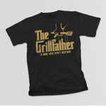 The Grillfather adult black t-shirt on a table