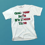 Grab your Balls It's Bocce Time adult white t-shirt on a table