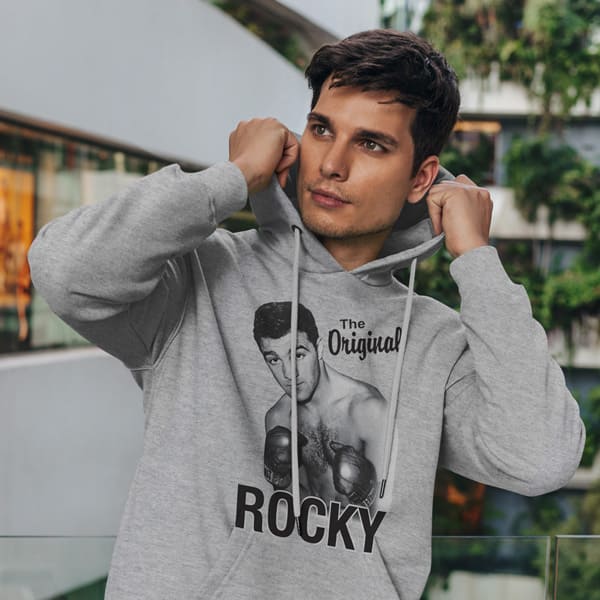 The original rocky adult grey hoodie sweatshirt on a man