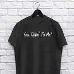 You Talk'in To Me? adult black t-shirt on a hanger
