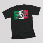 Pray for Me...My Wife is Italian adult black t-shirt on a table