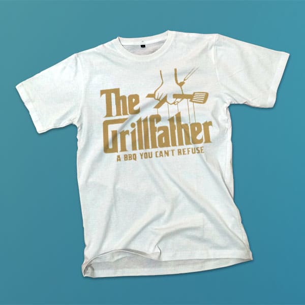 The Grillfather adult white t-shirt on a table