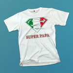 Super Papa adult white t-shirt on a table