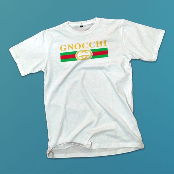 Gnocchi adult white t-shirt on a table